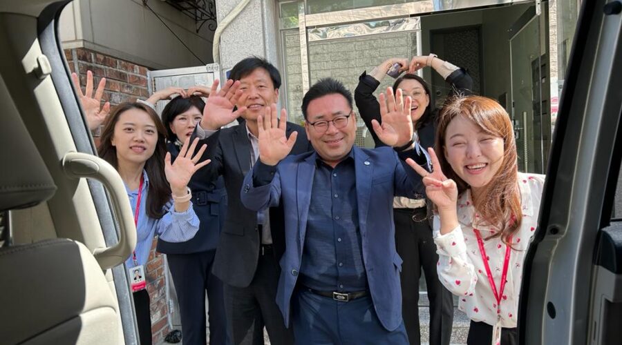 Members of the Busan Metropolitan Volunteer Center and hosts for the 2024 World Volunteer Conference wave good-bye after a recent visit.